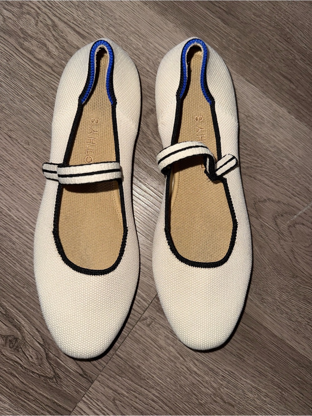 Rothy's Ivory Mary Jane Loafers with Black Trim and Blue Accent
